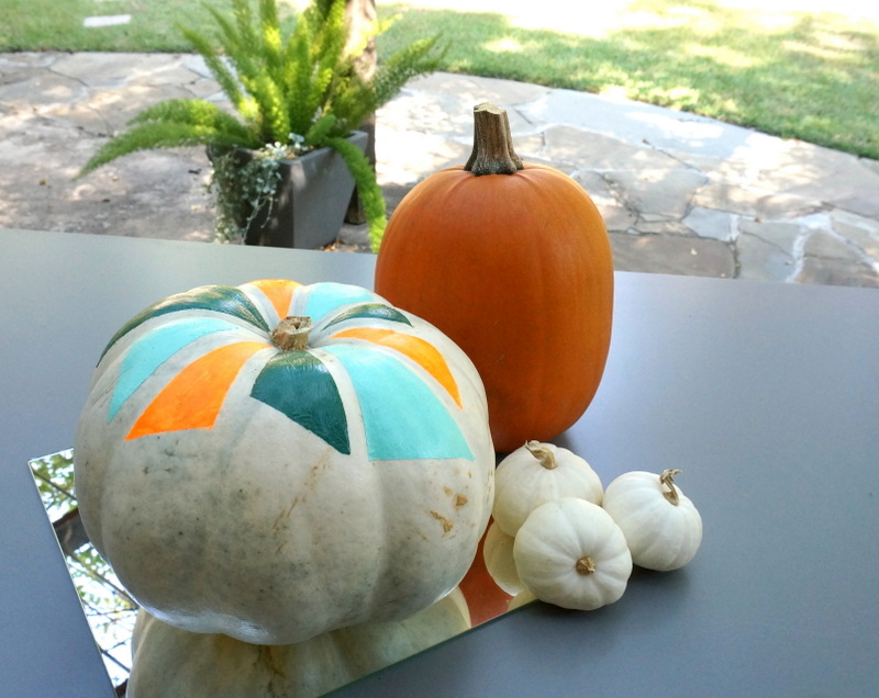 Fall table filled with pumpkins