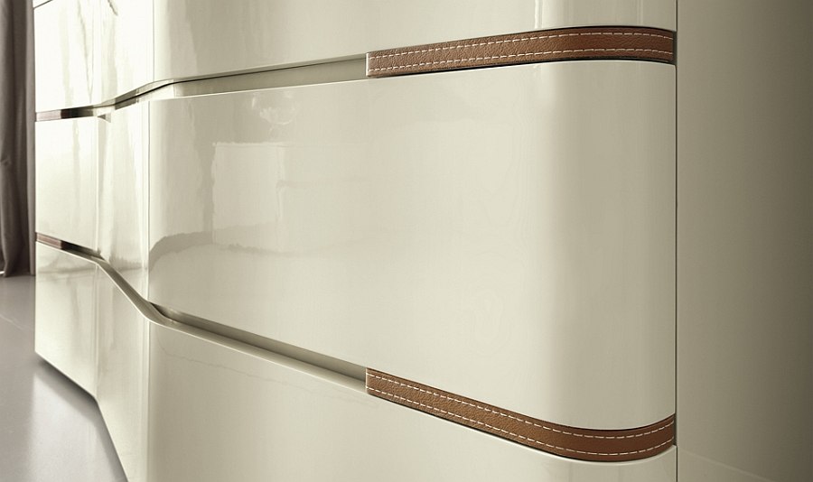 Gorgeous bedroom chest with sinuous shape and ecoleather inserts