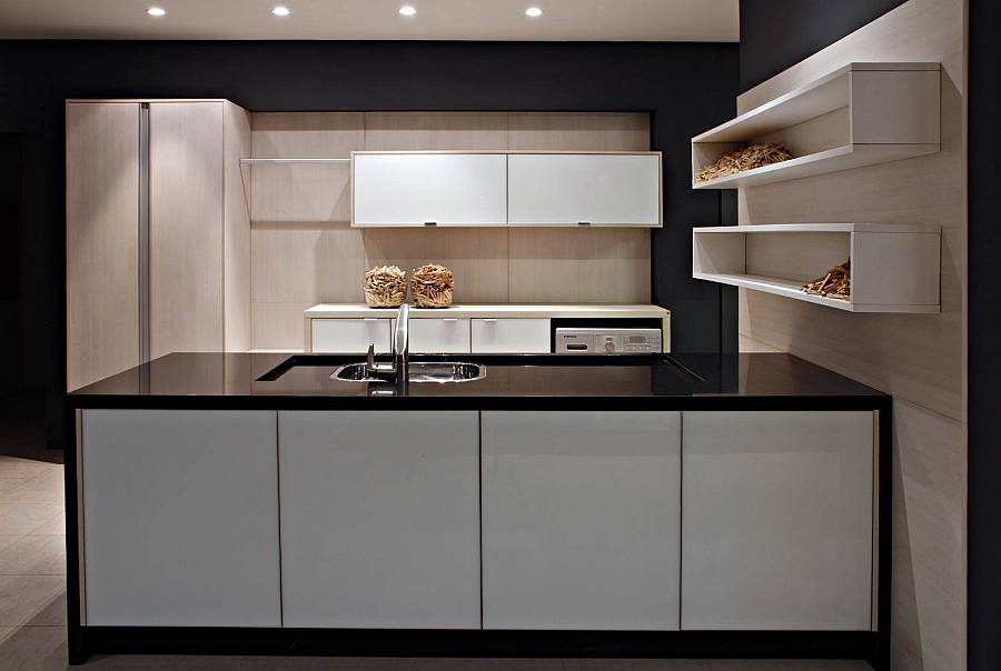 Gorgeous modern kitchen with black countertop and golden accents