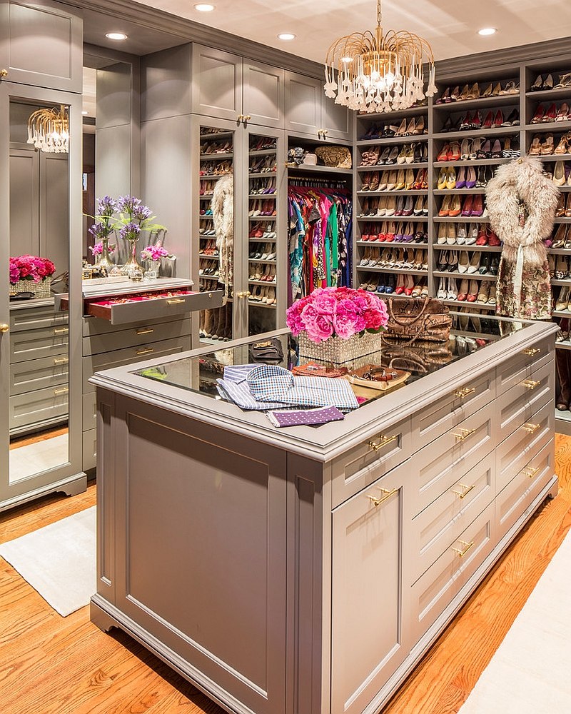 Grey and gold used elegantly in the feminine walk-in closet