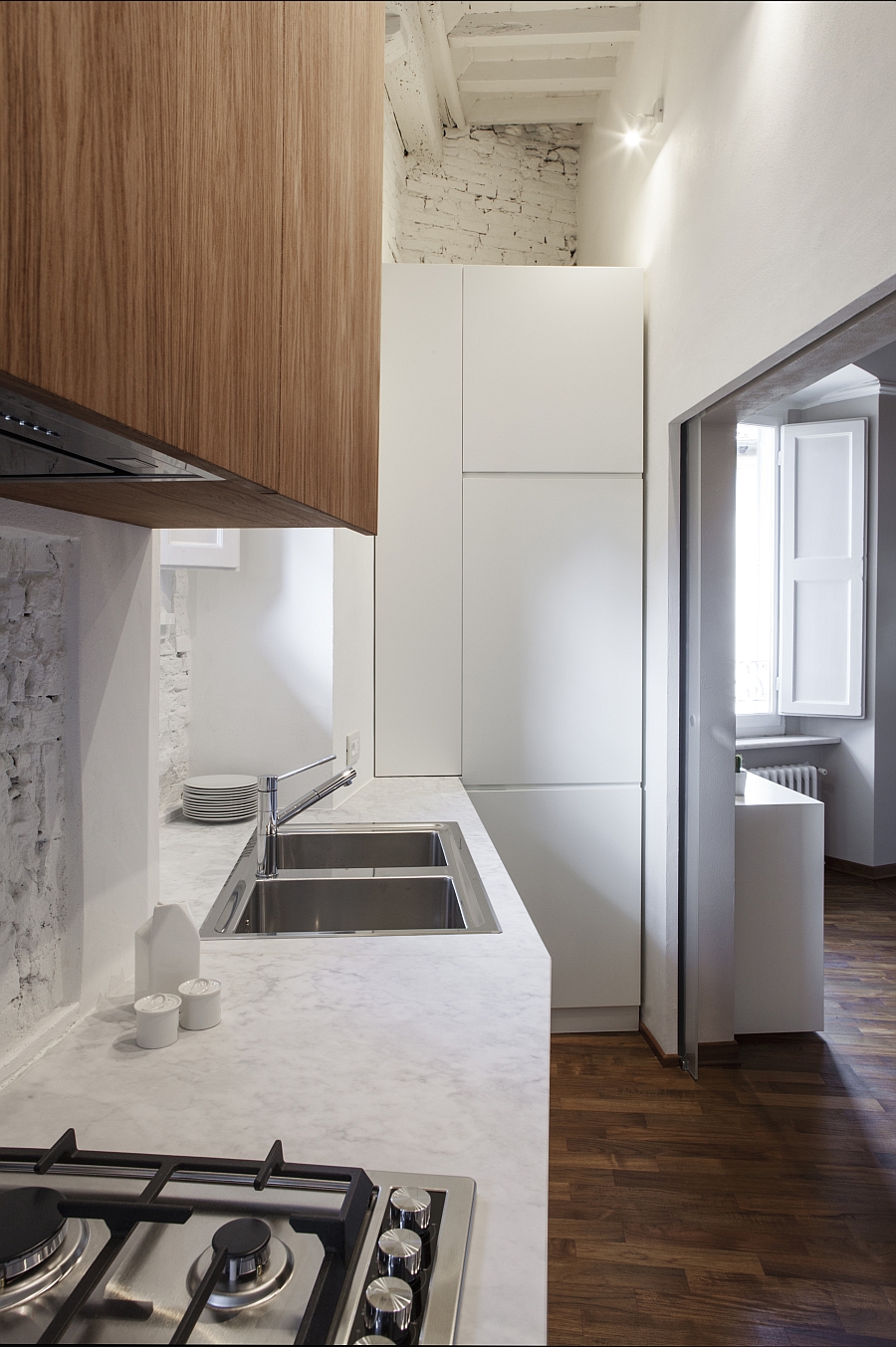 Innovative and compact kitchen utilizes available space to the hilt