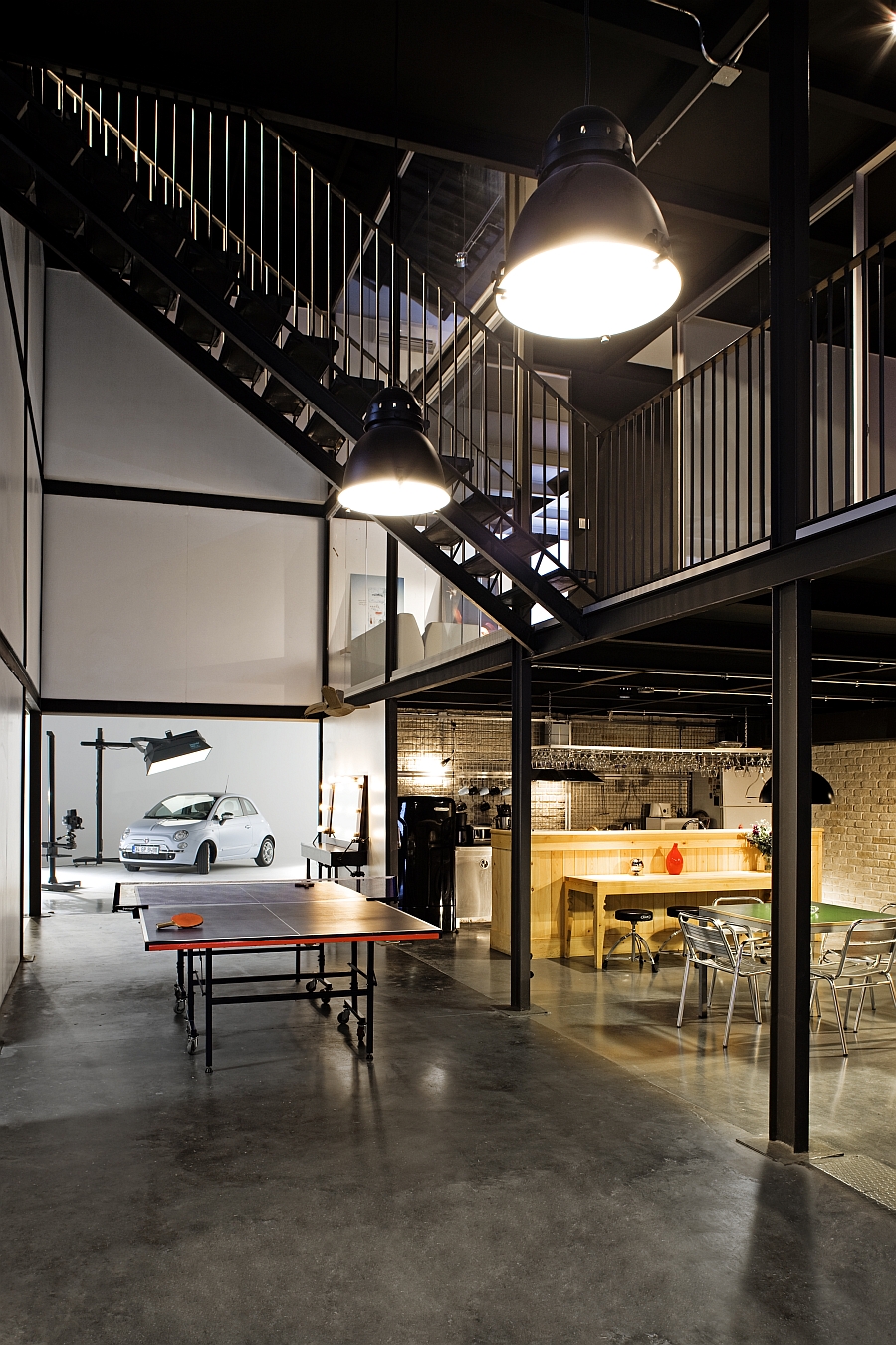 Large industrial style focusse lighting inside the PBlok office