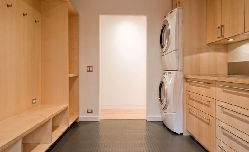 Laundry room with grey rubber flooring