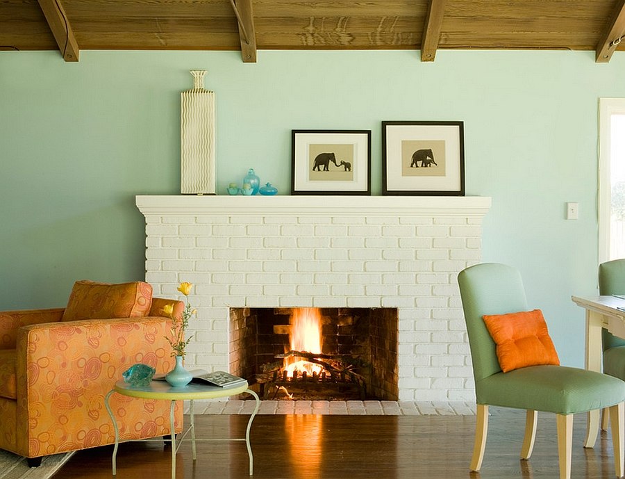 Lovely pops of color enliven the small living area [Design: Mark English Architects]