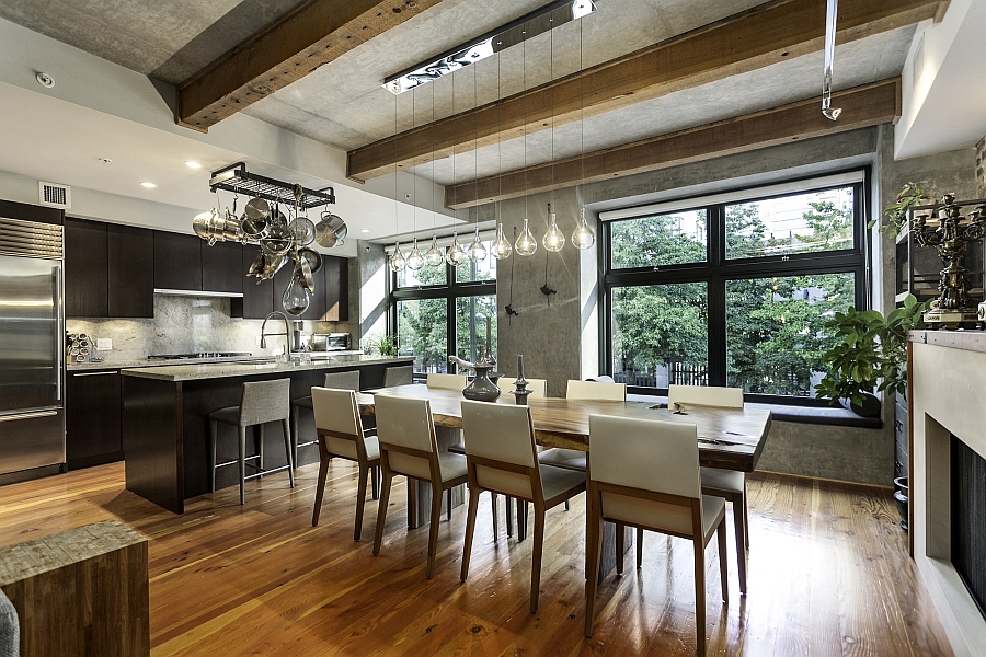 Lovely use of pendant lights in the kitchen and dining space