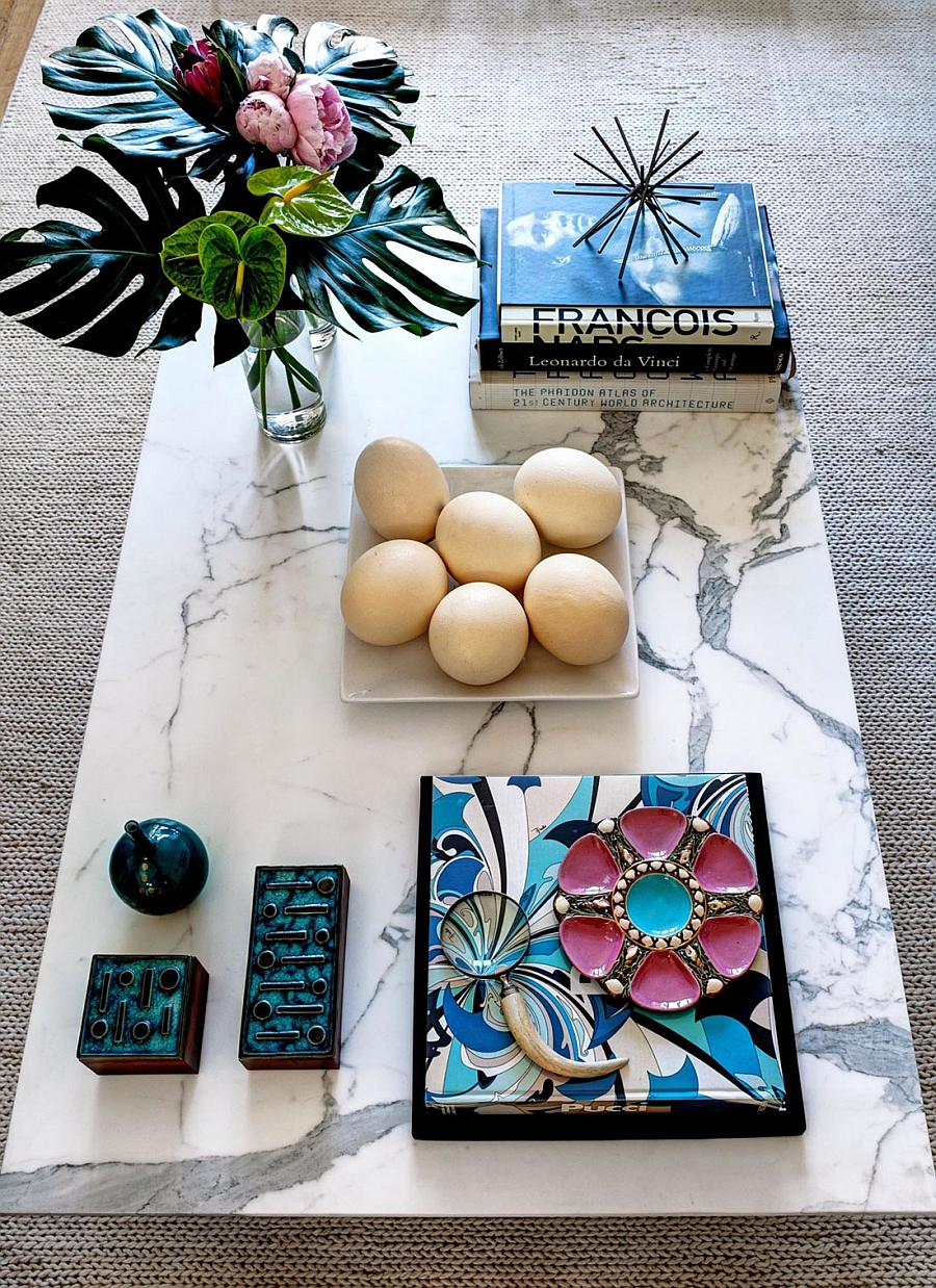 Marble coffee table coupled with carefully chosen accent additions