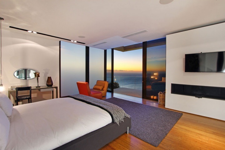 Modern guest bedroom with an ocean view