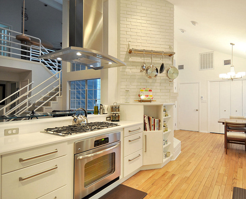 Modern kitchen with stainless steel pots