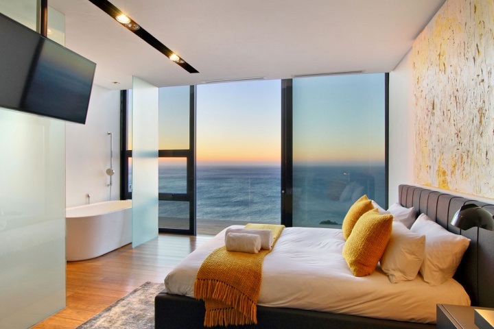 Ocean-front bedroom with a tub