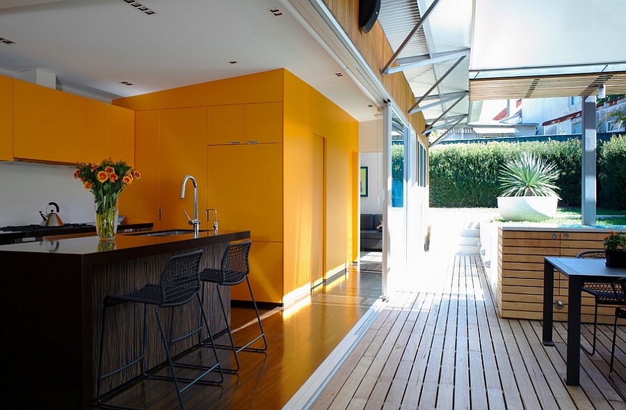 Orange and black can be a cheerful, trendy combination [By: Scott Weston Architecture Design]