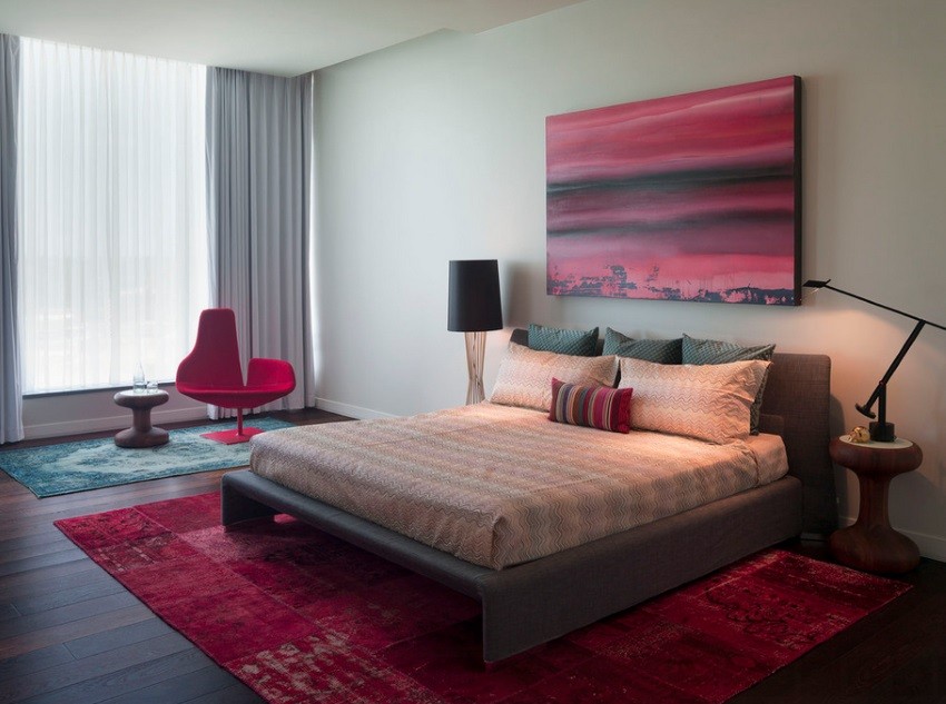 Overdyed rugs in a modern bedroom