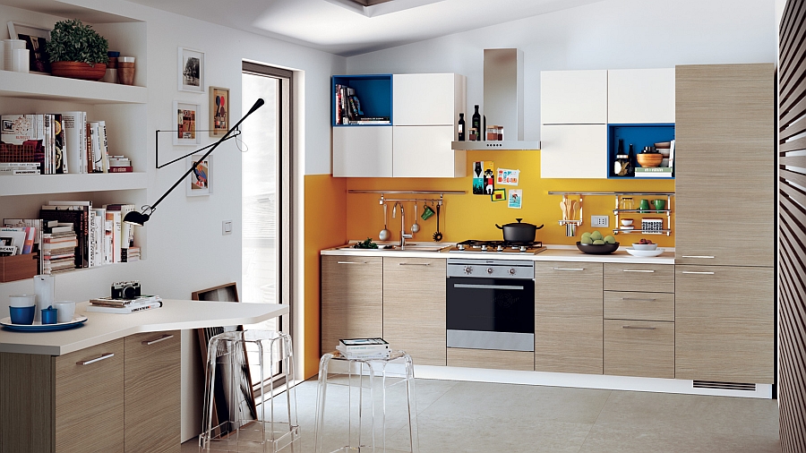 Pops of royal blue and orange enliven the posh kitchen