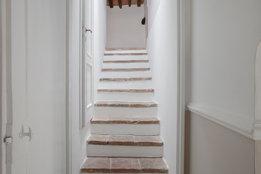 Private staircase leading to the master bedroom