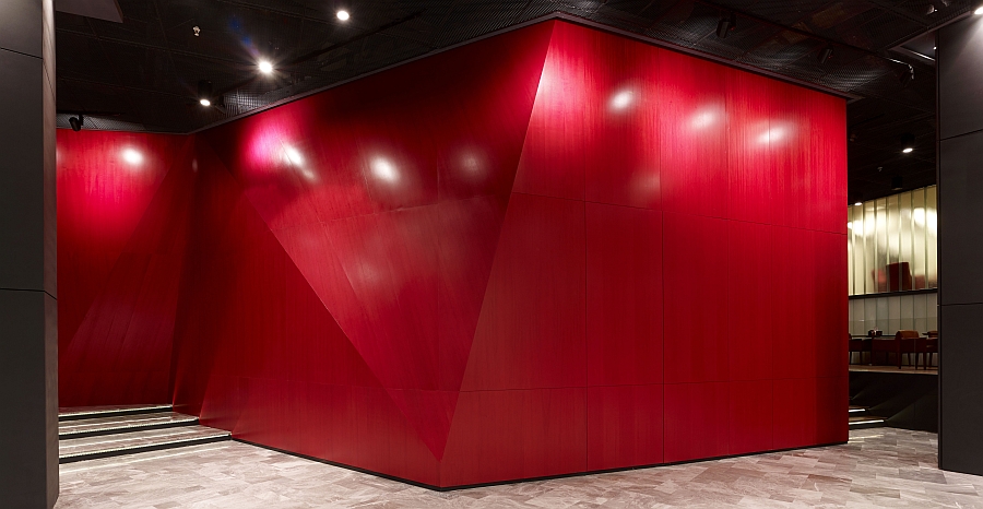 Red colored, wood covered distorted structure inside Dogus Headquarters