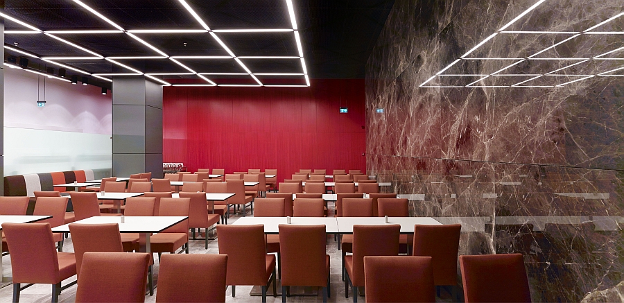 Red enlivens the dining and interaction space