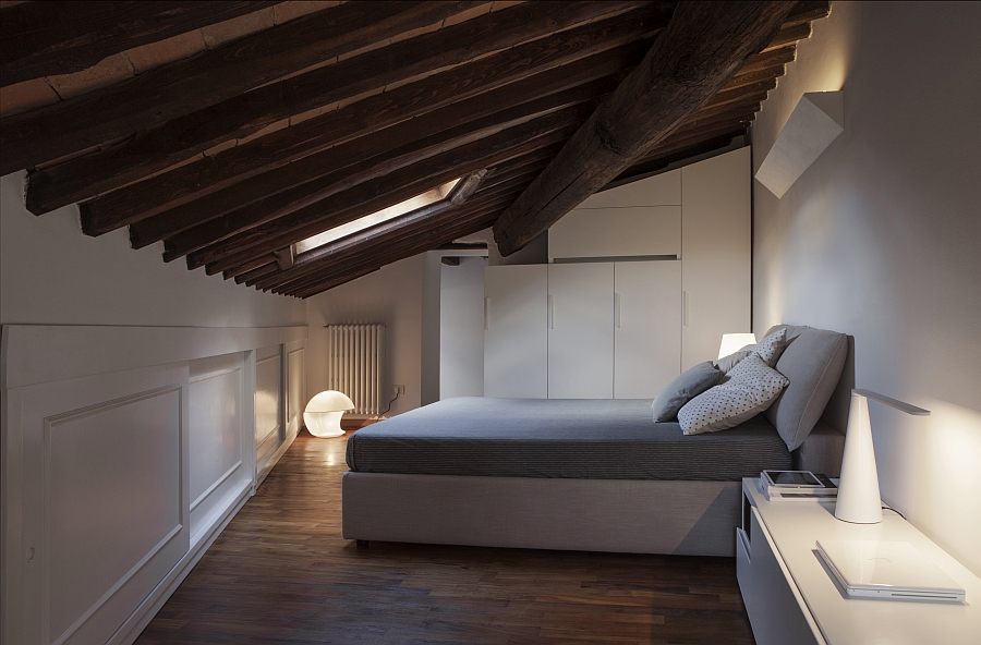 Skylight ushers in ample natural ventilation into the loft bedroom