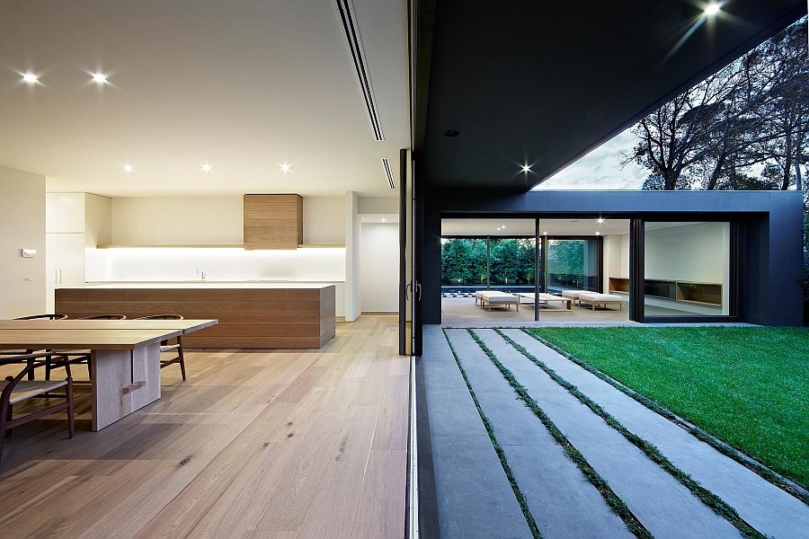 Sliding glass doors offer seamless connectivity between the interior and the outside world