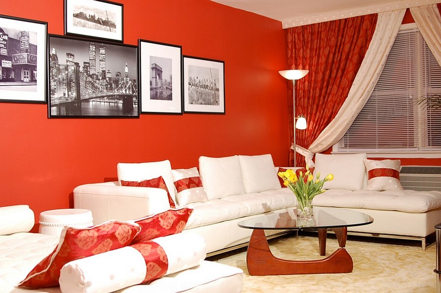 Small living room with red walls and Noguchi table