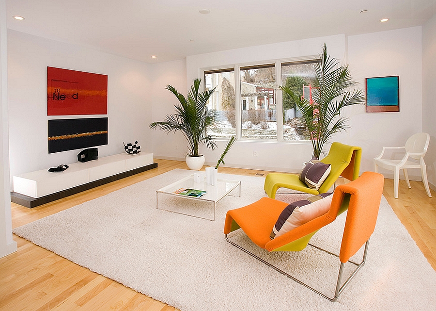 A splash of yellow and orange in the posh living room [From: RVP Photography]