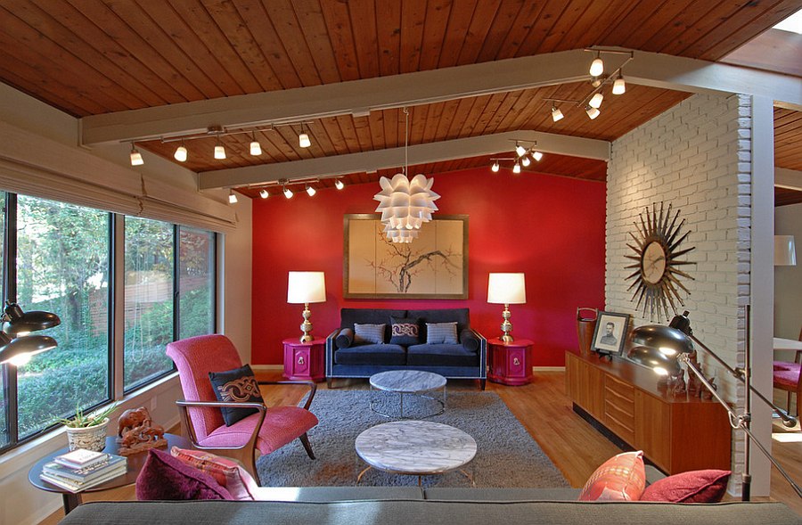 Spacious living room combines hot pink with red [By: Brian Patterson Designs]