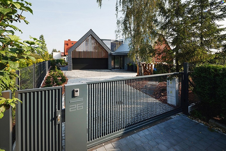 Street facade of the stylish Two Barnes House by RSPlus