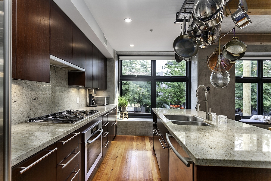 Traditional kitchen design with  apot rack above the island