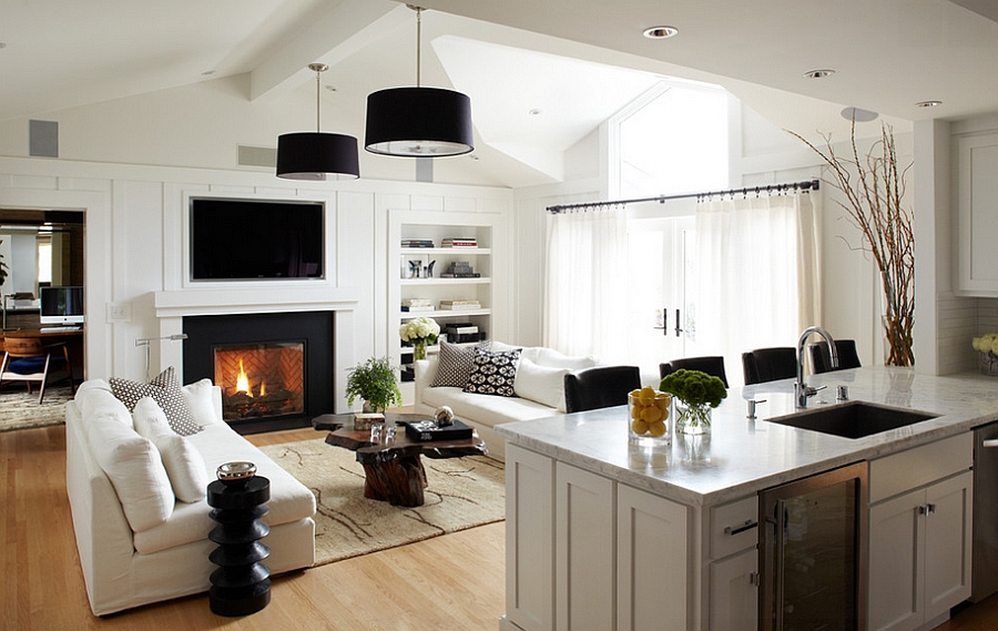 Trendy contemporary family room next to the kitchen [By: Urrutia Design]