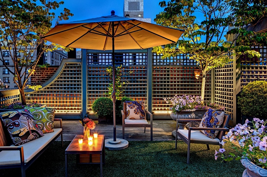 Warm lighting enhances the appeal of the stunning rooftop garden