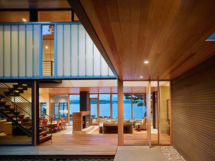 Wood plays a major role in shaping the inviting lake house