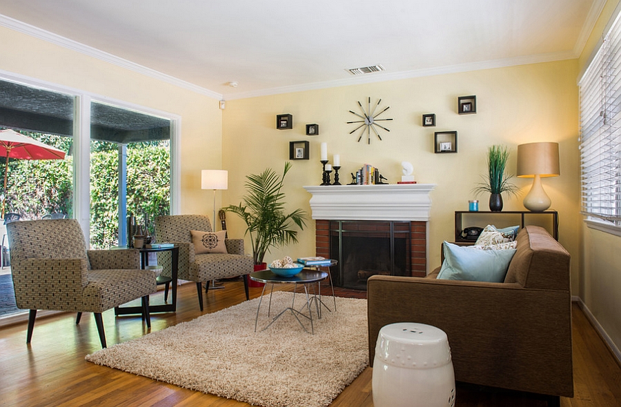 Yellow acts as a perfect backdrop for the stylish living space [Design: Elegant Domain Interiors]