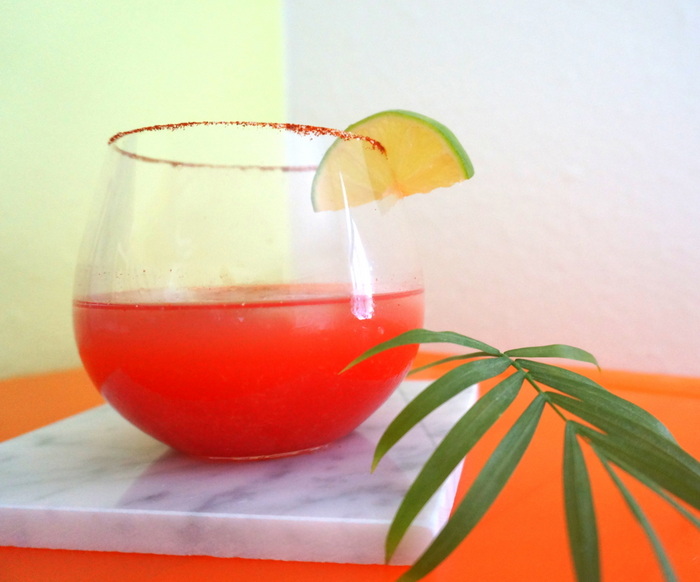 A tropical party drink with neon flair