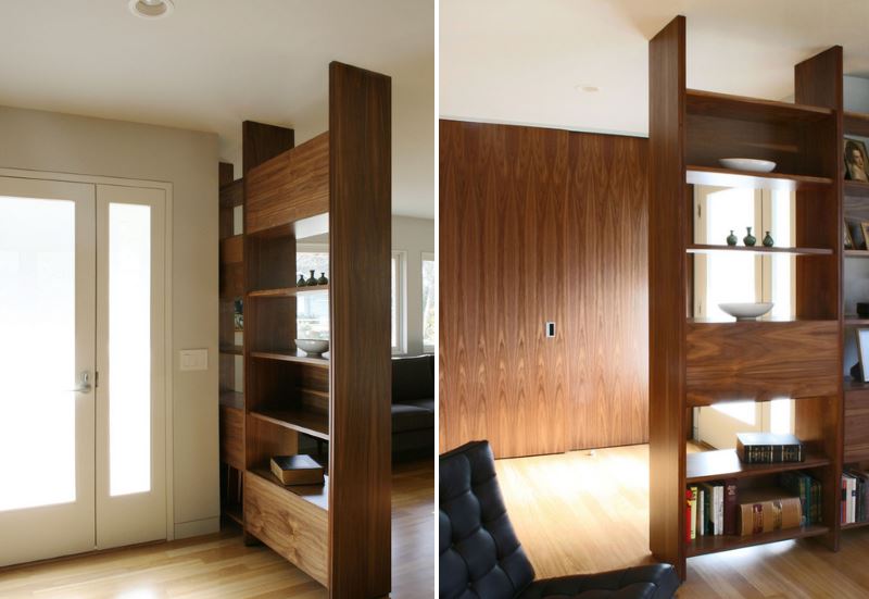 An entryway view from both sides of a bookshelf