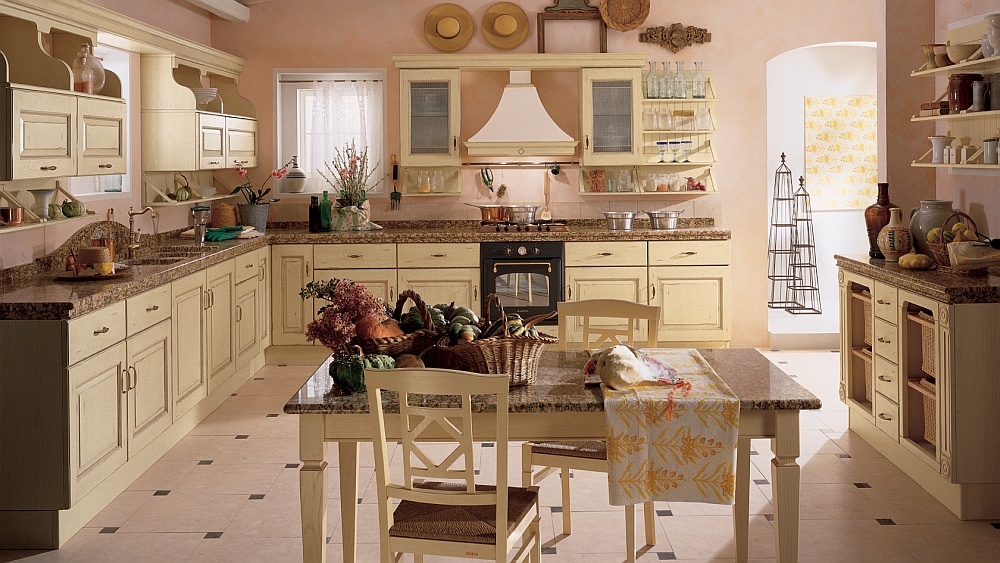 Antique cream and pink dominate teh traditional kitchen