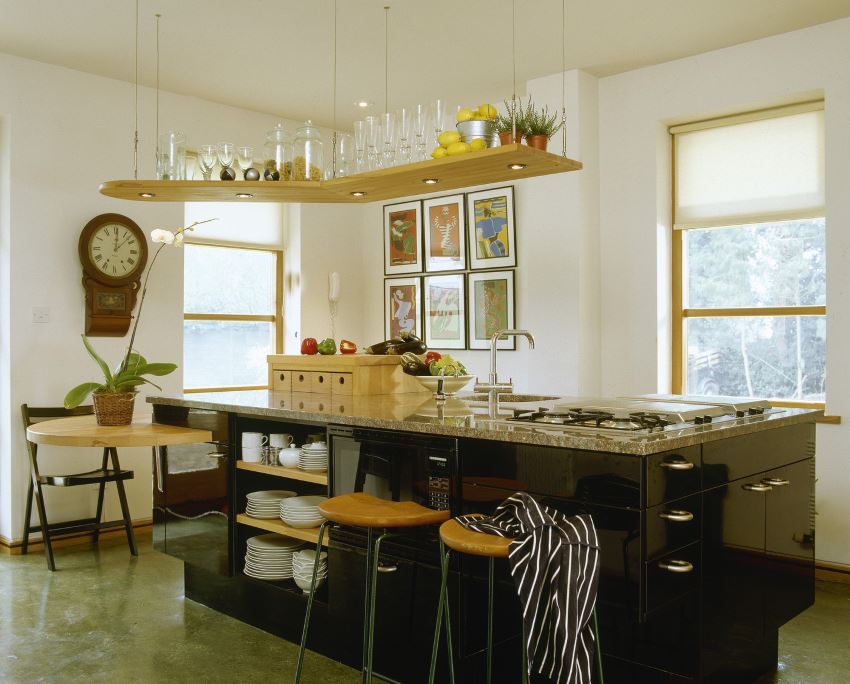 Ceiling-mounted shelving in an artful kitchen