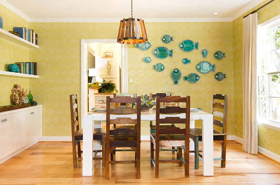 Clever blue accents enliven the yellow dining room