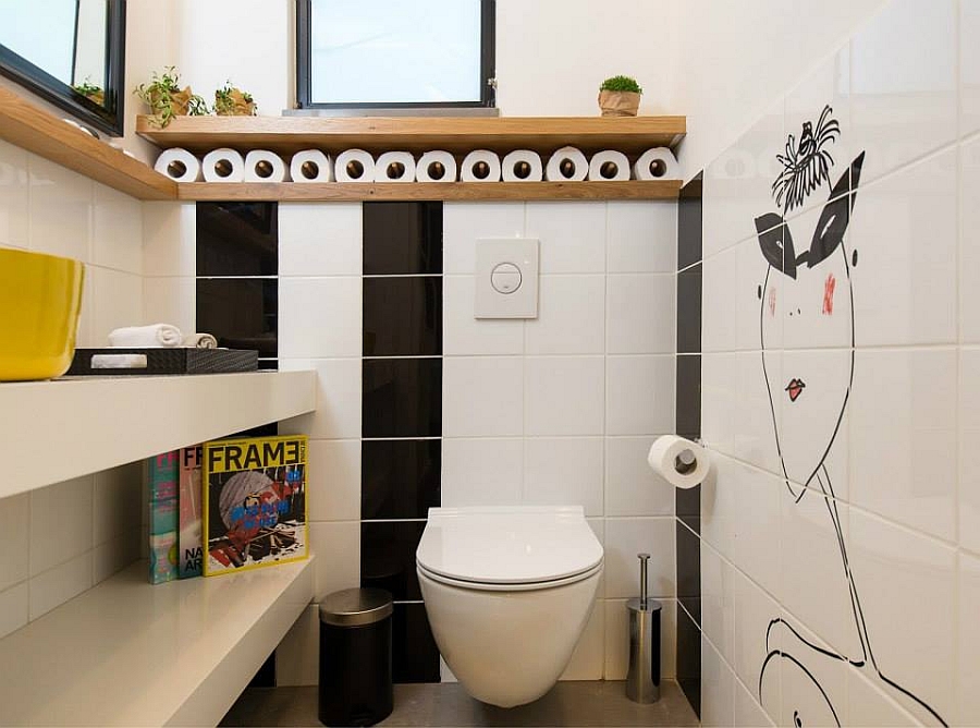 Clever use of space and wall art in the small bathroom