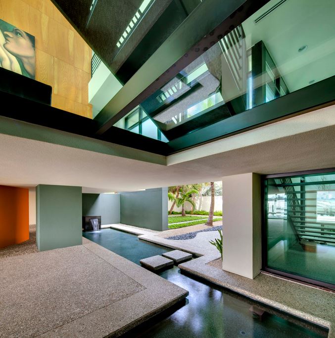 Contemporary entry with a modern water feature