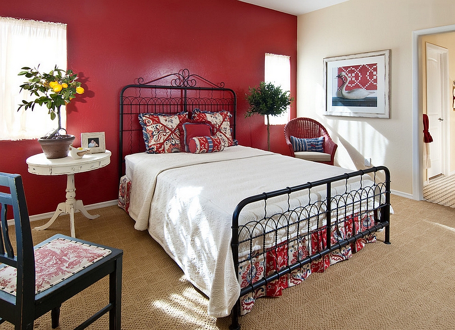 Cottage style bedroom with a gorgeous red backdrop