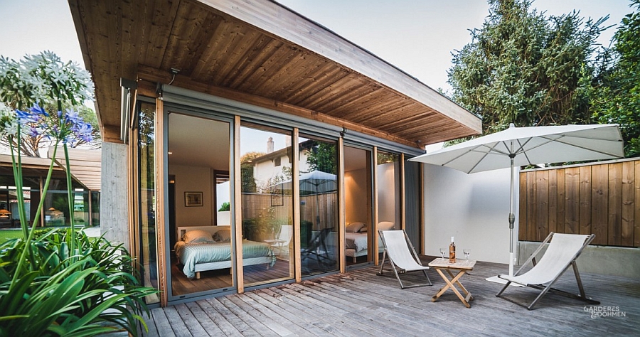 Elegant bedroom design that is connected with the deck