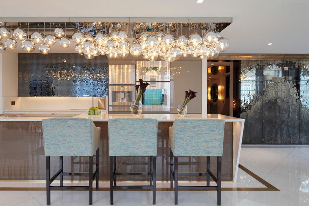 Festive modern kitchen featuring chromed glass orbs