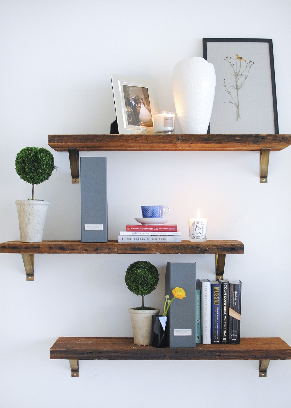 Floating wooden shelves inside the contemporary home