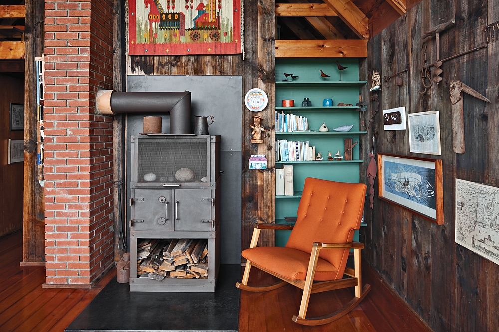 Gorgeous rocking chair next to the fireplace