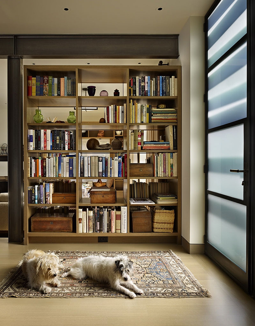 Gorgeous way to delineate spaces using bookshelves