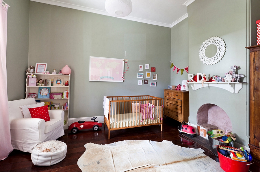 Gray-green walls add a glossy backdrop to the eclectic bedroom [Design: Twinkle and Whistle]