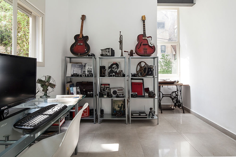 Home workspace with a collection of musical instruments