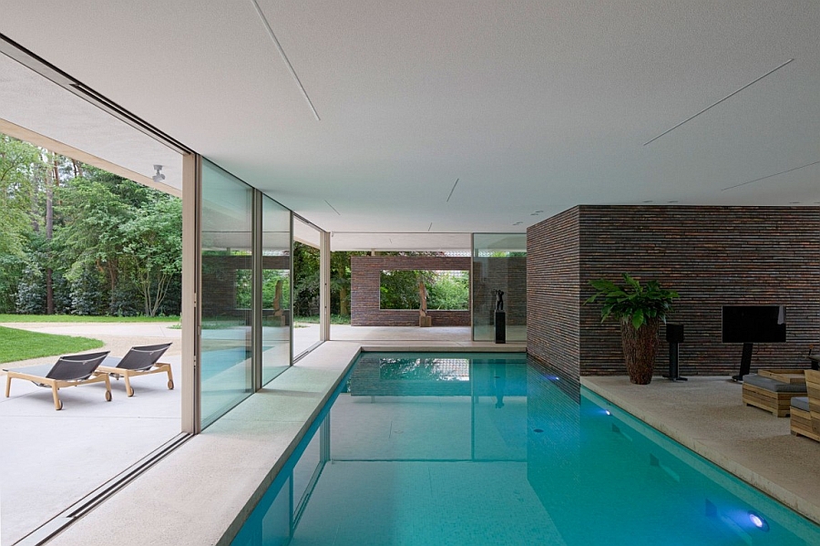 Indoor pool that is connected with the backyard outside