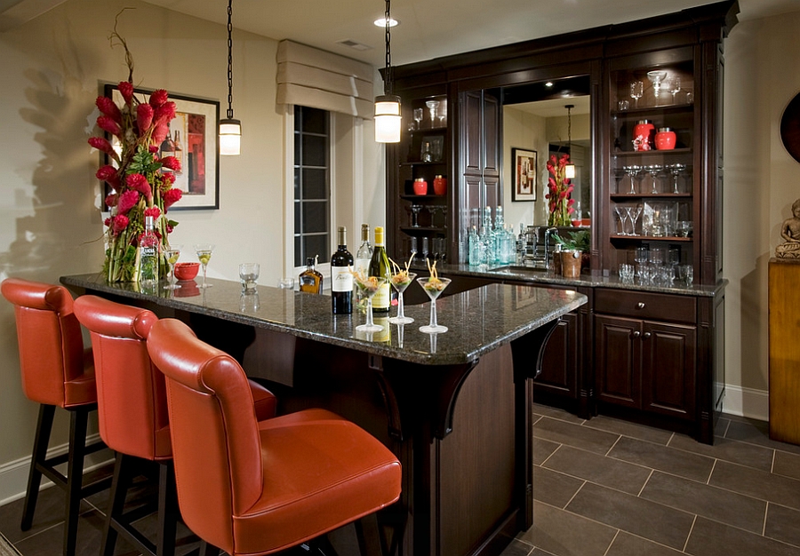 Interesting use of pops of orange in the basement [Design: Guidi Homes]