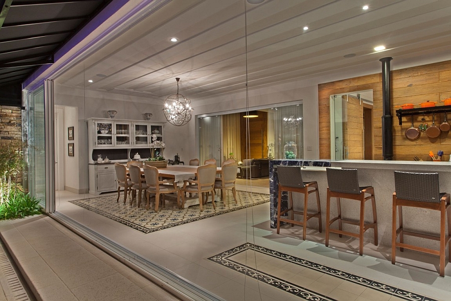 Kitchen and dining area blur the lines between interior and the outdoors