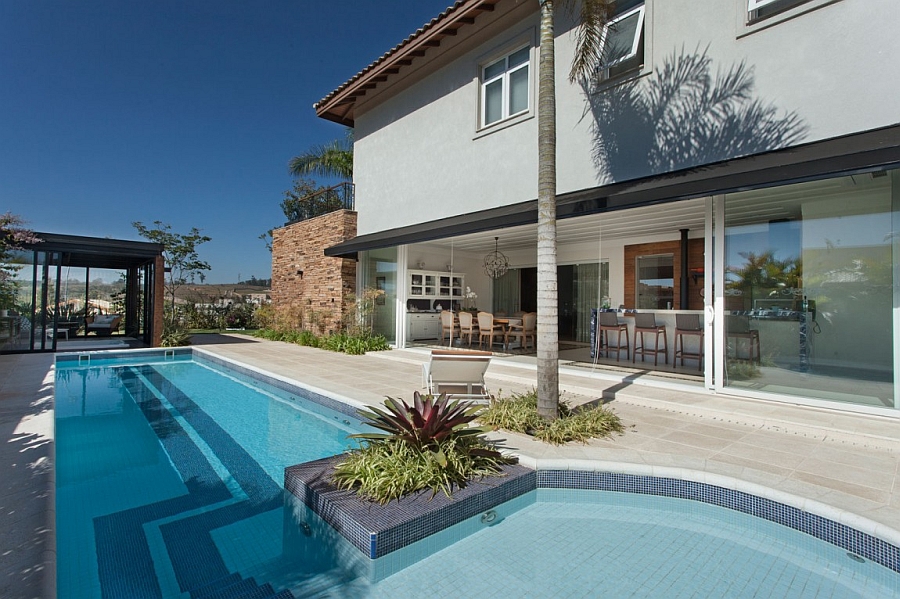 Lavish pool area of the private house with an outdoor lounge