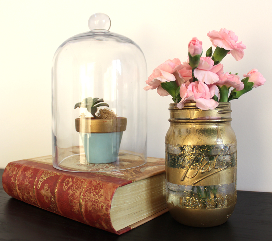 Mason Jar in Gold and Terrarium used as decorative pieces